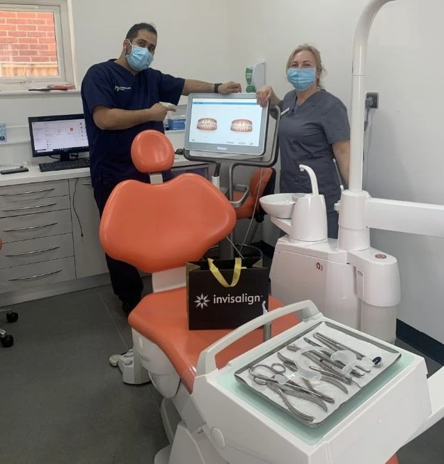 Experienced dental surgeons with iTero 3D scanning screen